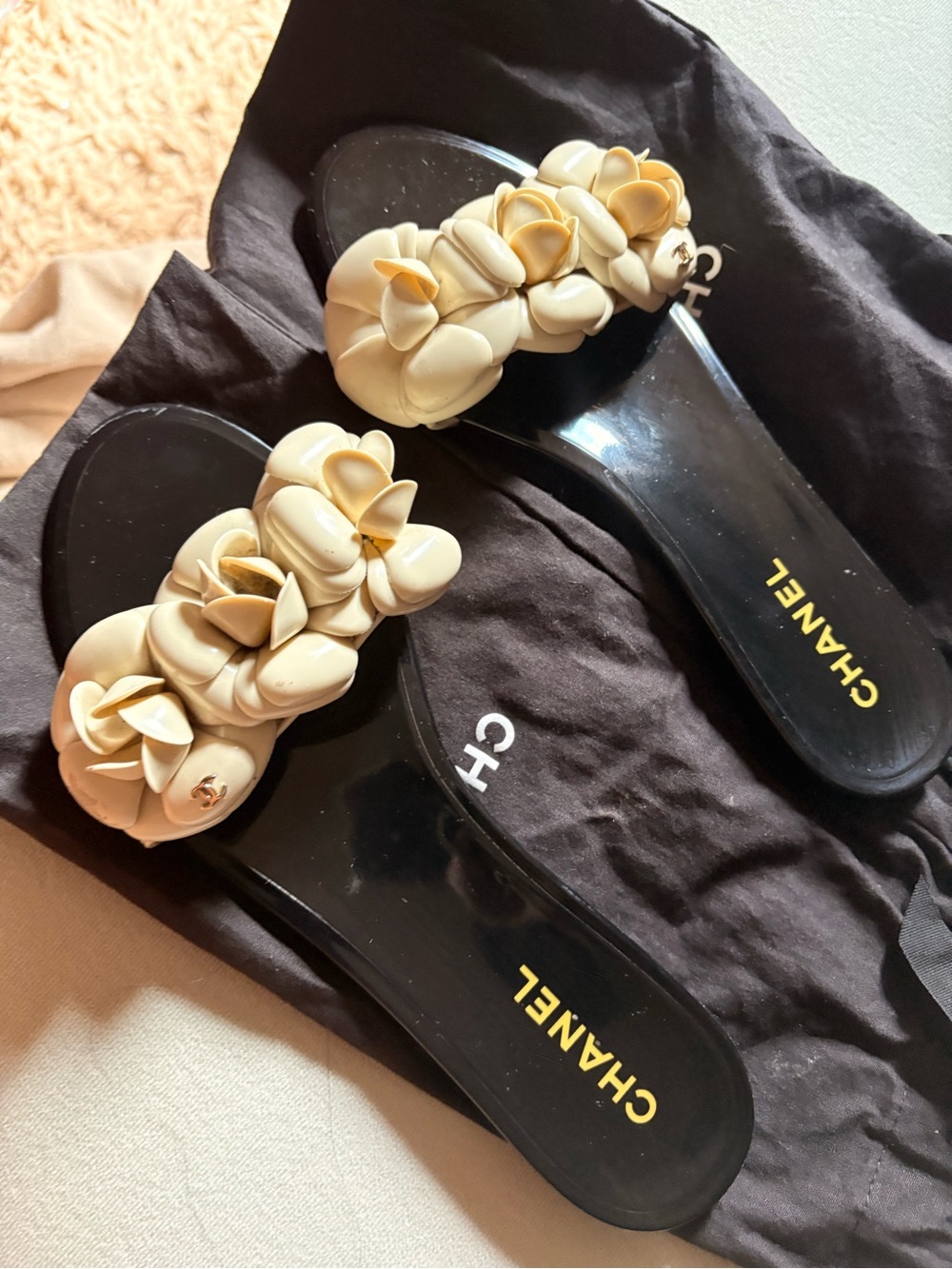 CHANEL Black Slide Sandals with Cream Floral Appliqué